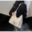 Túi Tote tối giản Urban Pu dành cho nữ có cấu trúc mềm mại và túi dây kéo bên trong để sử dụng thành phố
