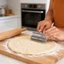 Dụng cụ xỏ khuyên bằng thép không gỉ có lỗ mở để chế biến bánh Pizza và trái cây