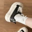 Giày trắng đế dày 7CM màu kem giảm béo thông thường Giày bánh mì đa năng