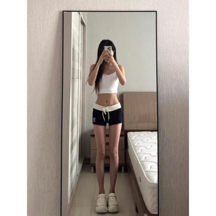 Quần short cạp thấp của Mỹ giảm béo quần thể thao thông thường thiết kế quần ôm ba điểm nóng