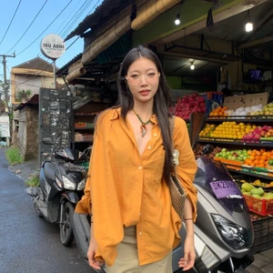 Áo sơ mi cotton và vải lanh màu cam mùa hè mới áo khoác cardigan dáng rộng có ve áo dài tay t