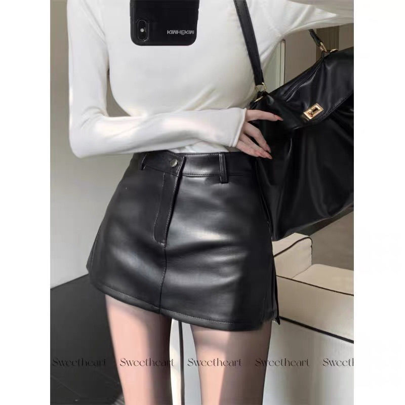 Váy chữ A màu đen cao cấp, chất liệu da PU mềm mại, thiết kế cut eo trendy cho thu đông