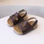 Giày sandal hai mũi hở mũi đơn giản cho bé trai, dép thể thao mùa hè mới, giày đi biển đế mềm