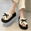 Giày lười đi biển đế dày phong cách cổ tích ngọt ngào cho nữ mùa hè với chân váy và sandal thắt nơ