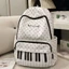 niche thiết kế ban đầu phím đàn piano chấm bi nhẹ ba lô đôi vai công suất lớn học sinh trung học