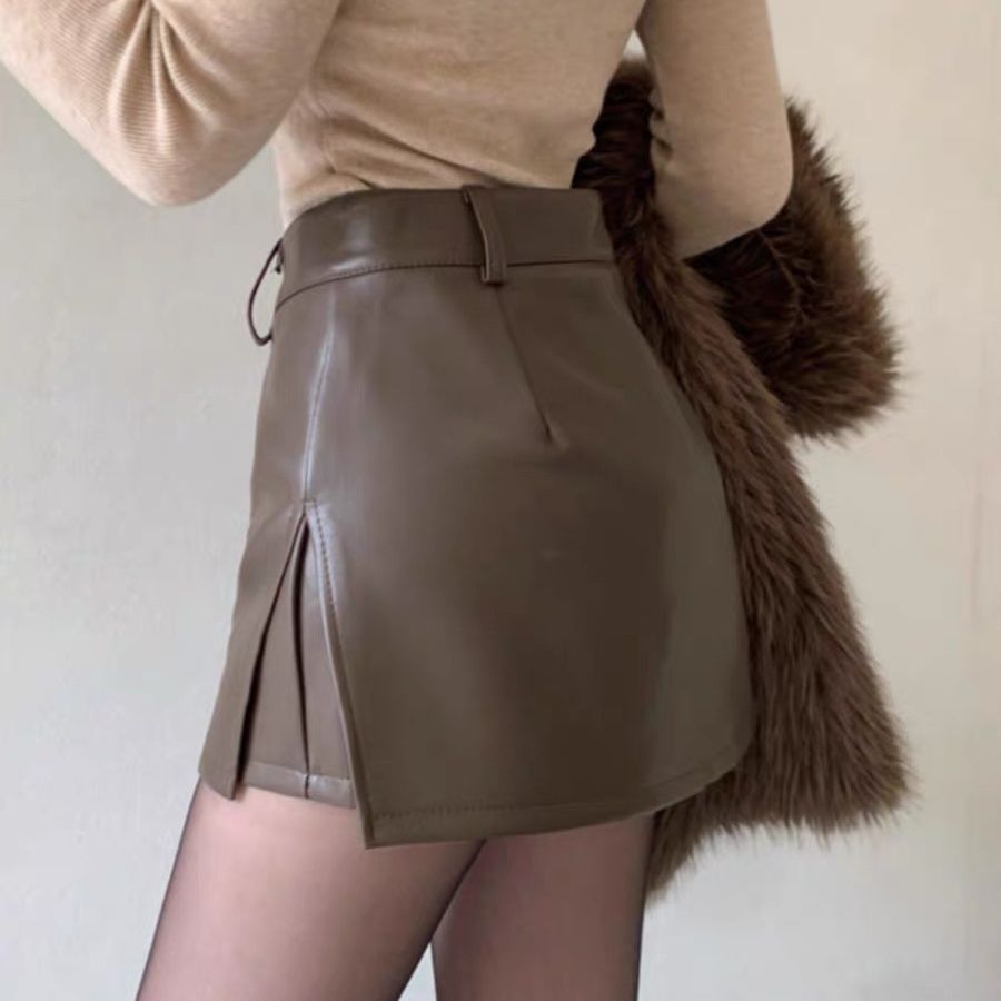Váy chữ A màu đen cao cấp, chất liệu da PU mềm mại, thiết kế cut eo trendy cho thu đông