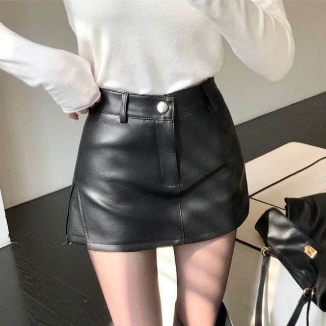 Váy chữ A màu đen cao cấp, chất liệu da PU mềm mại, thiết kế cut eo trendy cho thu đông