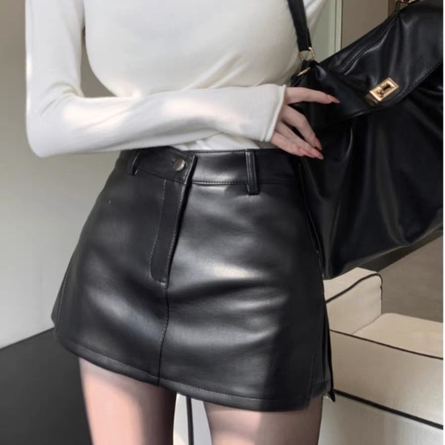 Váy chữ A màu đen cao cấp, chất liệu da PU mềm mại, thiết kế cut eo trendy cho thu đông