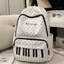 niche thiết kế ban đầu phím đàn piano chấm bi nhẹ ba lô đôi vai công suất lớn học sinh trung học