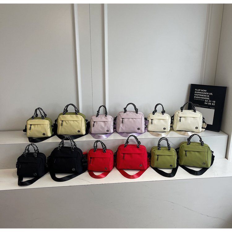 Ba lô Nylon Chống thấm nước Dung tích lớn Học sinh Schoolbag Cotton Lót Niche Design Ba lô