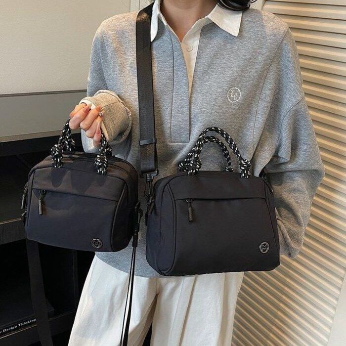 Ba lô Nylon Chống thấm nước Dung tích lớn Học sinh Schoolbag Cotton Lót Niche Design Ba lô