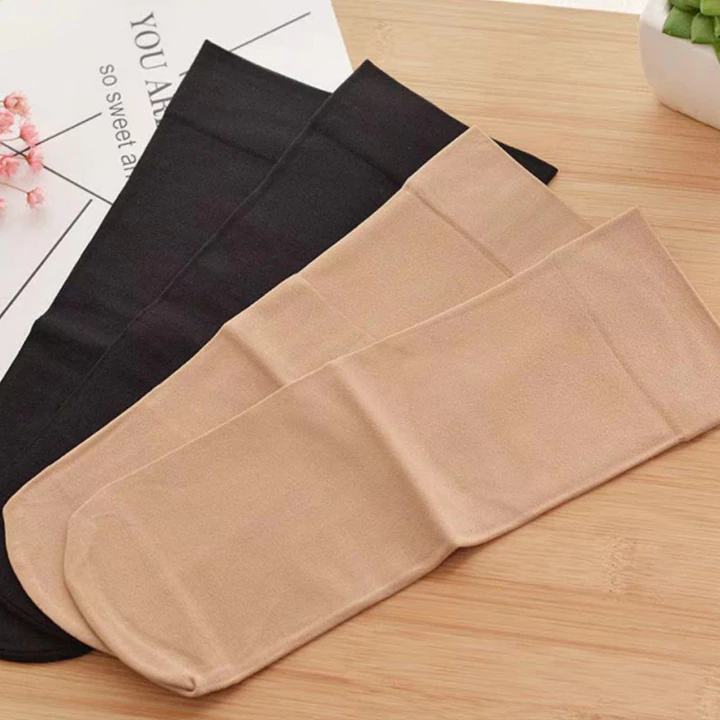 Vớ nữ trong suốt mới - Vớ chống chạy giữa bắp chân (Đen/Da) với đầu vớ gia cố và phần trên thoải mái rộng rãi.