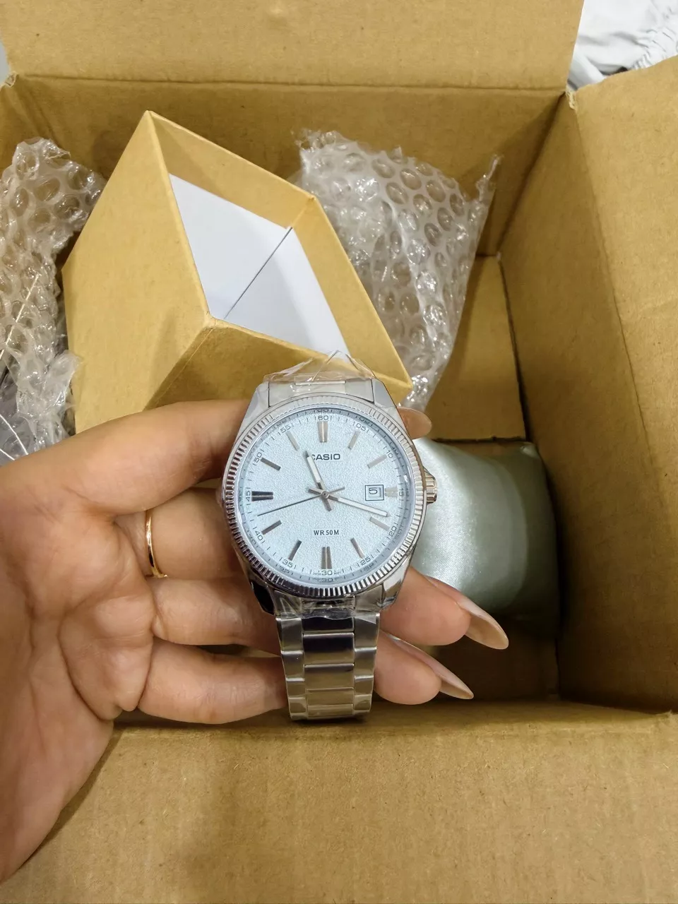 Casio MTP-1302DA-2A2 mặt số xanh ice blue