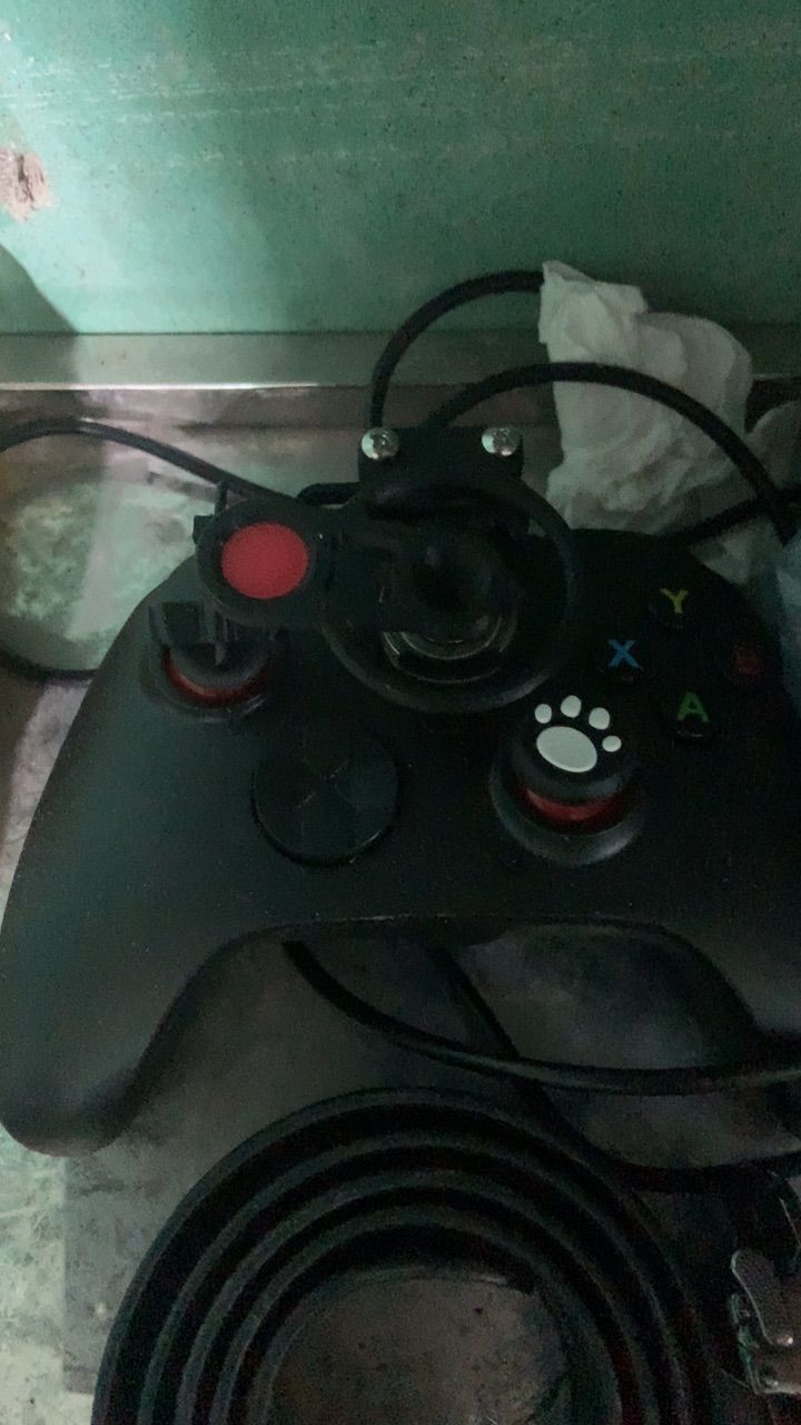 Phụ kiện vô lăng gắn trên tay cầm chơi game