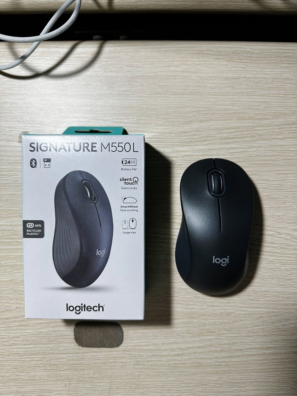 Kết nối Logitech M550 Signature