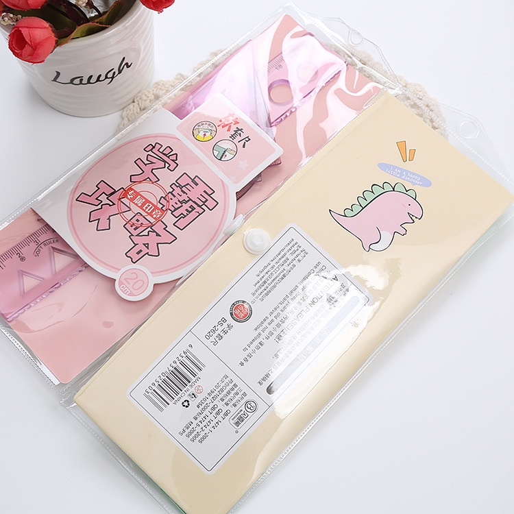 Túi 4 thước nhựa dẻo khủng long và truyện tranh cute