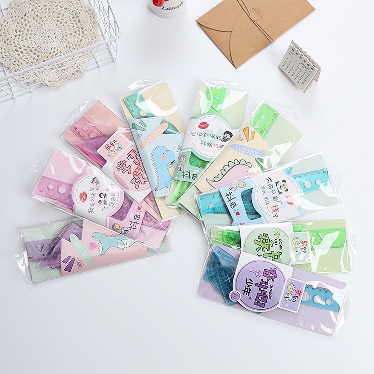 Túi 4 thước nhựa dẻo khủng long và truyện tranh cute