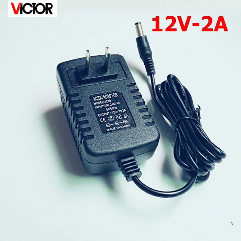 TECHZOCO Alimentatore 12V 0,6A da Parete - Caricatore con Adattatore di Alimentazione, Connettore DC 5,5 x 2,1 mm, Nero