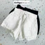 Quần short jean nữ trắng vải kaki lai tua rách dễ thương cá tính, dễ phối đồ AnNgo - AT228