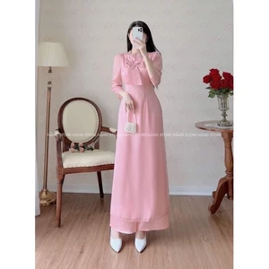 áo dài hồng cổ bèo kết hợp nơ đáng yêu