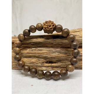 Vòng Tay Trầm Hương 8 ly Phối Charm Hoa Sen .