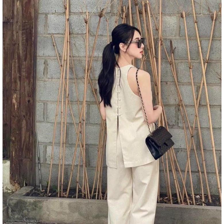 Áo sát nách nút bọc xoè quần suông dài