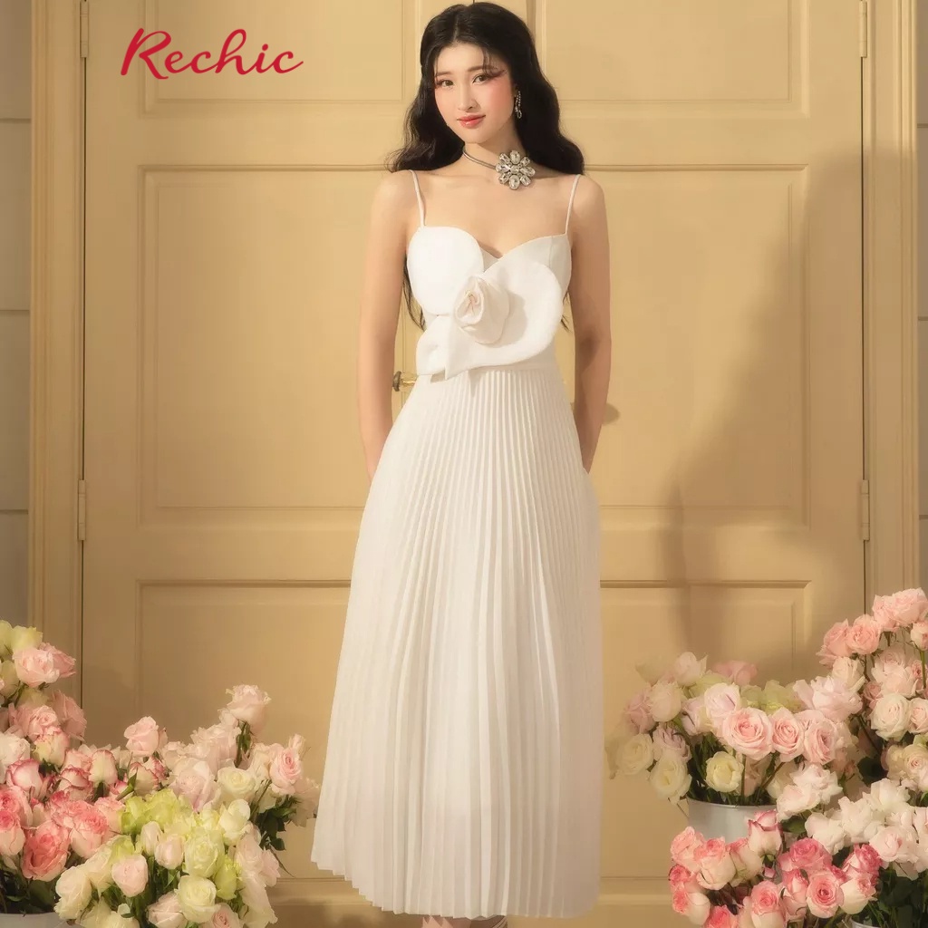 RECHIC Đầm Dài Eser dáng hai dây đính hoa to trước ngực phần tà váy dập ly thời thượng spe