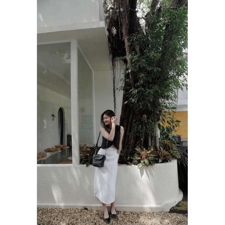 Set linen áo sát nách cổ tròn gài nút dáng croptop form rộng + chân váy trắng dài