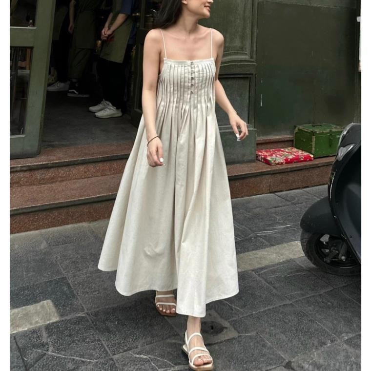 Đầm hai dây linen xếp li ngực nút gỗ dáng dài xoè có túi