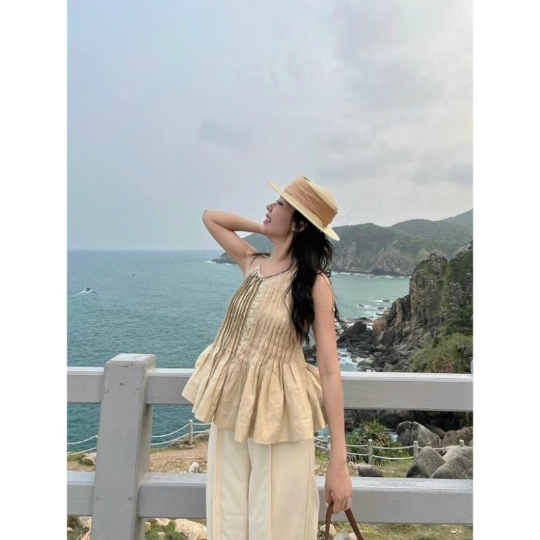 Áo yếm linen xoè nơ sau xếp ngực