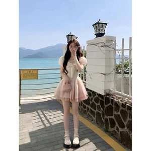 "Đầm váy thời trang nữ chất gấm loang hồng, cột nơ voan tơ, có mút ngực và lớp lót QC, phù hợp đi chơi 🌹" Mon Fashion