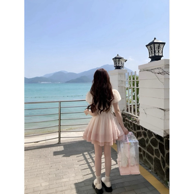 "Đầm váy thời trang nữ chất gấm loang hồng, cột nơ voan tơ, có mút ngực và lớp lót QC, phù hợp đi chơi 🌹" Mon Fashion