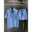 Bộ sơ mi denim cao cấp, dệt mịn thanh lịch cho phong cách thời trang tinh tế và sang trọng.