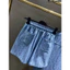Bộ sơ mi denim cao cấp, dệt mịn thanh lịch cho phong cách thời trang tinh tế và sang trọng.