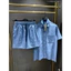 Bộ sơ mi denim cao cấp, dệt mịn thanh lịch cho phong cách thời trang tinh tế và sang trọng.