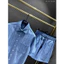 Bộ sơ mi denim cao cấp, dệt mịn thanh lịch cho phong cách thời trang tinh tế và sang trọng.