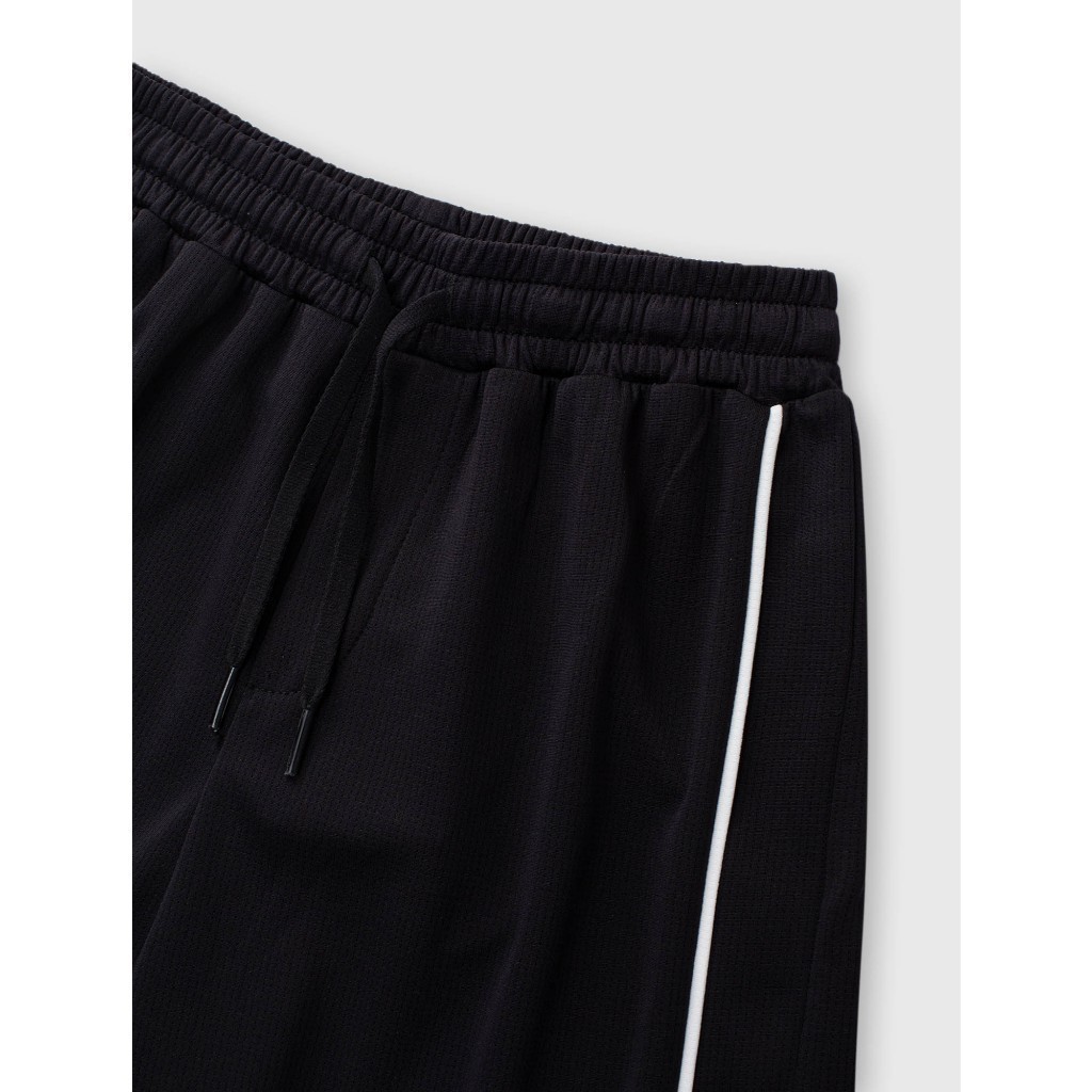 Quần short active bé trai CANIFA ống rộng có hình in 2BS25S016