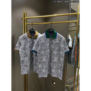 Áo Polo cotton dệt có họa tiết logo lá độc đáo, thiết kế tinh tế và thời trang cho mọi dịp.
