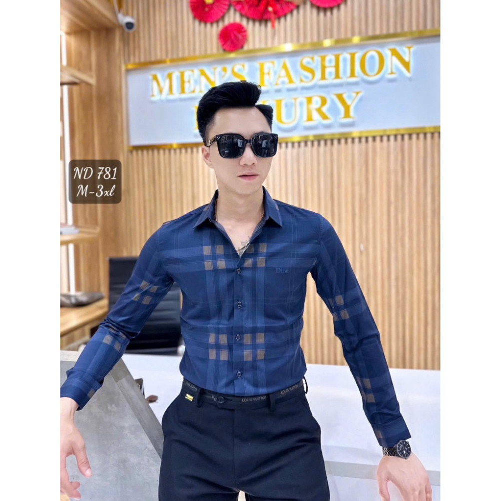 Áo Sơ Mi nam từ chất liệu kaki mềm mại, thiết kế tàu min và thêu họa tiết sắc nét, thời trang.