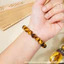 Hoả tốc - Ngọc Đan Tâm - Vòng Tay Mắt Hổ Vàng Nâu 10mm 5A - Mệnh Thổ & Mệnh Kim