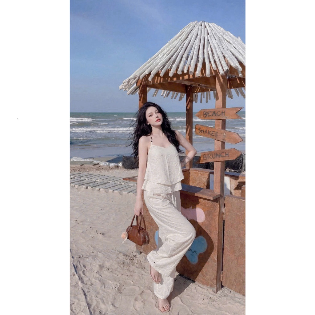 Set bộ thời trang nữ chất đũi mềm áo kiểu dây yếm mát mẻ áo tà bèo sành điệu quần ống rộng đi biển thoải mái Monfashion