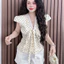 Set bộ áo chấm bi viền ren cột nơ kèm quần short kiểu dáng dạo phố đi chơi Monfashion