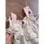 Set áo hoa dây nơ + chân váy mini hồng nữ tính, dễ thương Mon fashion