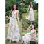 Đầm thời trang nữ sang xịn chất voan mịn mát cổ V hoa xoắn eo váy dài dáng xòe họa tiết in nổi bật Mon fashion