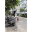 Đầm maxi đen ngắn tay cổ V đính cúc thắt đai eo chất thun co giãn phong cách Hàn Quốc HCOM27734