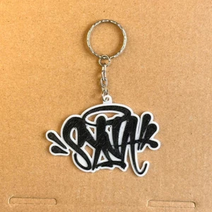 Móc khóa Syna Synaworld họa tiết nổi phong cách drip đen mây