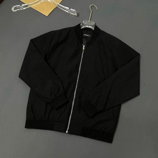 Áo Khoác Bomber Gió Nam Nữ DSQ Đen Thân Trơn Khoá Zip Bạc Ống Bo Sọc Gân Lót 2 Lớp Đơn Giản Basic Hot Trend 2025