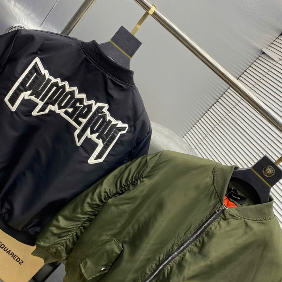 Áo khoác bomber gió unisex màu đen, thêu chữ da Purpose Tour, lưng có túi khóa tay trần, bông 3 lớp AK121P. Boy Phố 2025