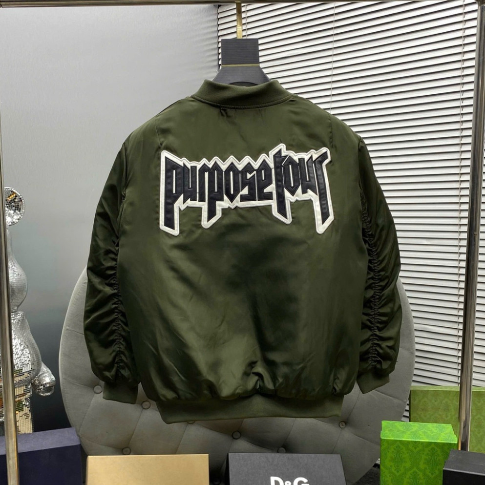 Áo khoác bomber gió unisex màu đen, thêu chữ da Purpose Tour, lưng có túi khóa tay trần, bông 3 lớp AK121P. Boy Phố 2025