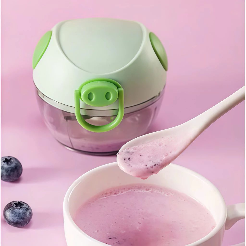 Máy Xay Tỏi Ớt Đa Năng Mini Cầm Tay Loại Mới - Dụng cụ xay tỏi ớt mini dây rút hình lợn dễ thương lưỡi thép không gỉ